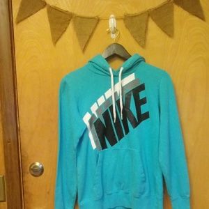 Turquoise Nike hoodie. Size M Womens